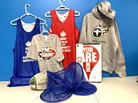 Full lot showing jerseys, T-shirt, hoodie, rugby ball, hamper, sign