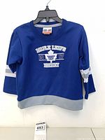 Front view showing logo, size and overall condition