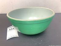 Side view showing green exterior of Pyrex mixing bowl