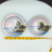 Both bowls side by side with measuring tape showing diameters