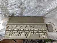 Top view of Atari 1040ST computer with mouse