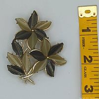 Front view showing floral design, colours and ruler for scale