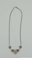 Full view of necklace showing length and pendant design