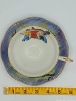 Top view saucer with interior artwork and measurement