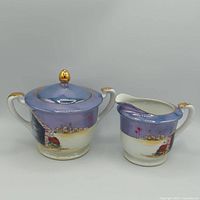 Full view of creamer and lidded sugar bowl
