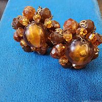 Front view of both amber cluster earrings