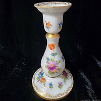 Full view of porcelain floral candlestick