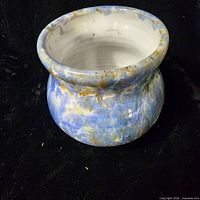 Front view of vase showing glaze pattern and shape