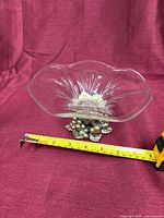 Side view showing bowl profile, base and tape for size reference