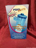 Front of Pool Buddy box showing product image and key features