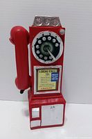 Front view showing payphone details and handset