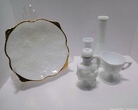 Group shot of all five milk glass items