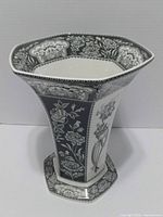 Overall view of hexagonal vase front and rim detailing