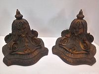 Front view of both matching ornate resin wall shelves