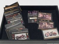 Tray with two main stacks of Harley-Davidson trading cards