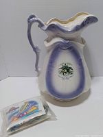 Pitcher standing with sealed toy bag in foreground