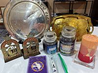 Group shot of trays, bookends, candles, cards and mezuzah