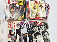 Top view showing multiple Life magazines including Beatles and 1995 Year In Pictures