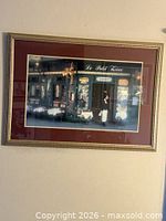 Full view of framed print on wall