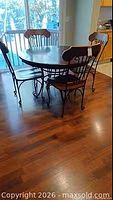 Dining set full view showing round table and four chairs