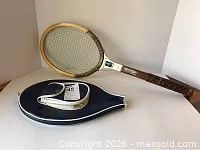 Full view of Wilson wooden racket and navy blue case