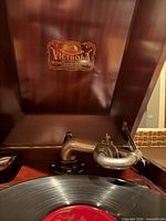 Interior view showing Victor decal under lid and tonearm
