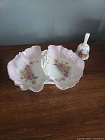 Divided porcelain dish and dinner bell front view