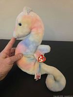 Left side view of Ty Neon seahorse showing overall shape and colors