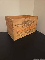 Front view showing main stenciled branding and crest