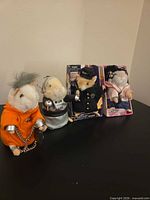 All four themed hamsters, two boxed, displayed