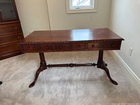 Full view of mahogany William IV style library table front and top