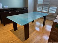 Full view of glass table and legs