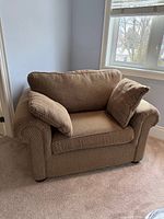 Front angled view showing overall chair design and cushions