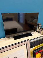 Front view of Samsung 37-inch LED TV on stand