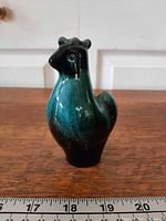 Front view of rooster shaker showing glaze