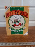 Front cover showing title, authors, cartoon chef and tagline