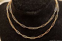 Full necklace displayed on bust form