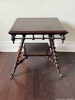 Full frontal view of walnut side table