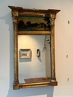 Front view showing entire pier mirror with painted panel and mirror