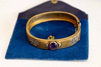 top view showing amethyst, engraving, pouch