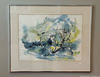 Framed watercolour painting front view on wall