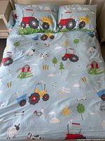 Full view of duvet cover on bed with both pillowcases