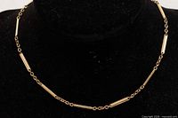 Full view of gold-filled bar-link necklace on display