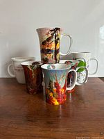 Six mugs arranged together showing all items and designs