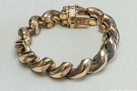 Full view of bracelet showing link design and clasp