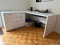 Overall view of desk assembled with cabinet under return