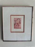 Full view of framed etching with mat and frame