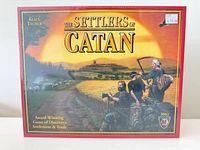 Front view of sealed Settlers of Catan box