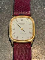 Front view of watch showing dial, case and strap