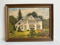 Full view of framed oil painting showing house, garden and frame style